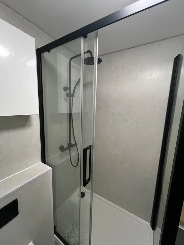 Black sliding shower screen and matching rainfall shower